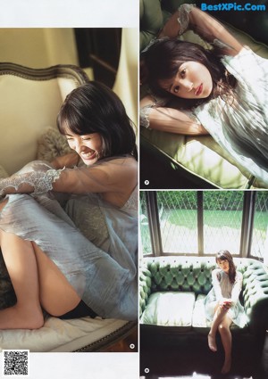 A woman leaning against a window in a magazine.