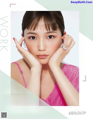 A magazine with a woman's face on the cover.